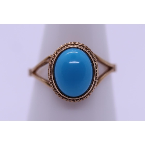 39 - 9ct gold turquoise set ring - Size O