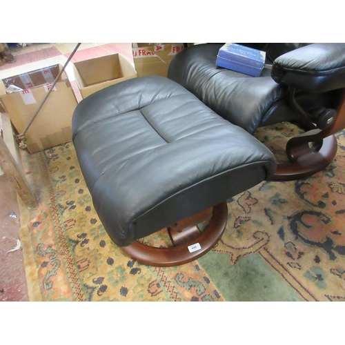 449 - Black leather stressless armchair with footstool