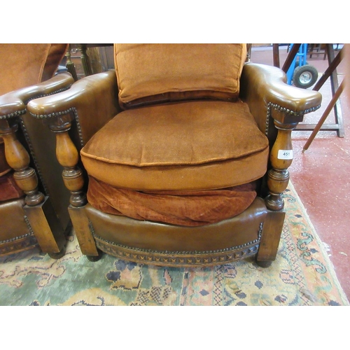 451 - Pair of leather and carved oak tub chairs