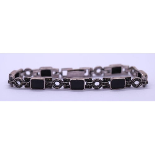 63 - Silver & onyx bracelet