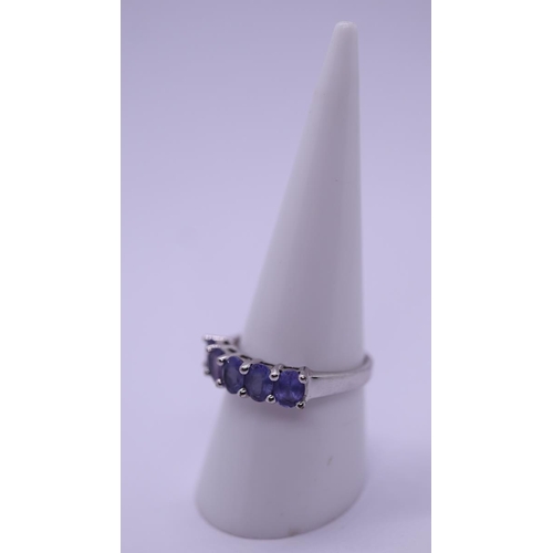 82 - 9ct white gold 5 stone tanzanite set ring - Size Q