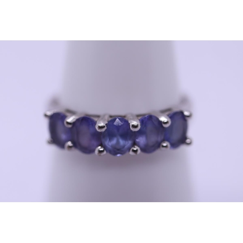 82 - 9ct white gold 5 stone tanzanite set ring - Size Q