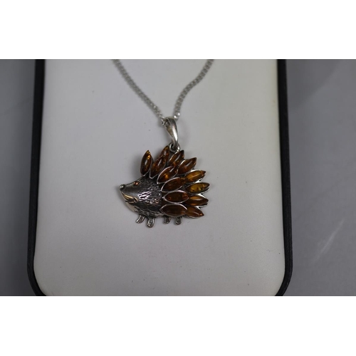 17 - Silver and amber hedgehog pendant on chain