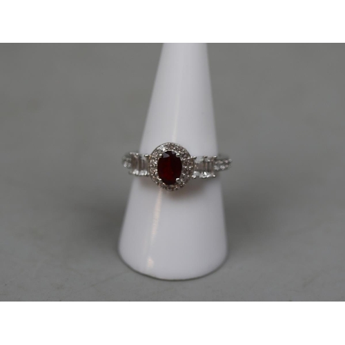 27 - Silver garnet set ring - Size P