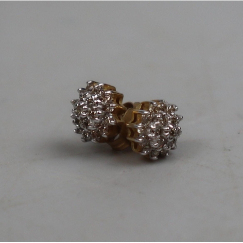 37 - Pair of 9ct gold diamond cluster earrings