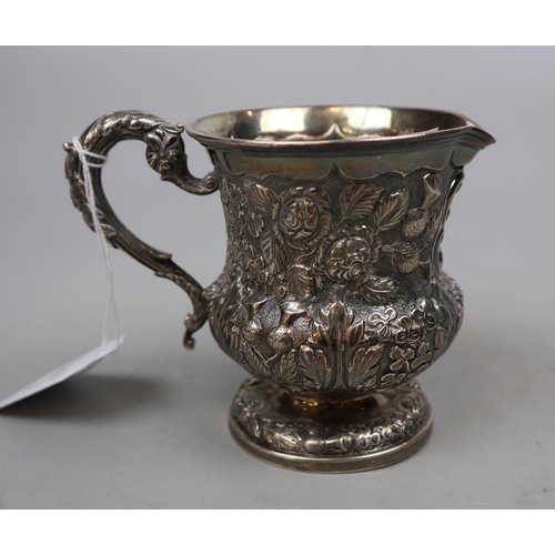 4 - Hallmarked silver jug embossed with floral pattern - Weight 144g