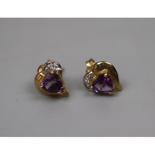 41 - Pair of 9ct gold amethyst set earrings