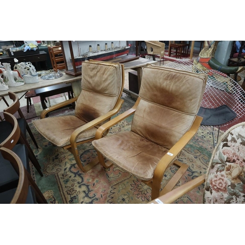 494 - 2 Swedish Beech and leather armchairs.