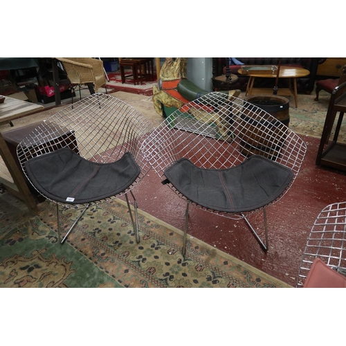 497 - Pair of Bertoia Diamond style chairs with black cushions