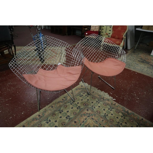 498 - Pair of Bertoia Diamond style chairs with pink cushions