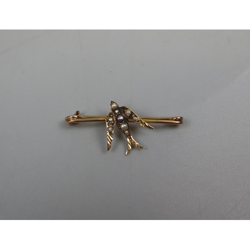 58 - 9ct gold swallow bar brooch set with seed pearls