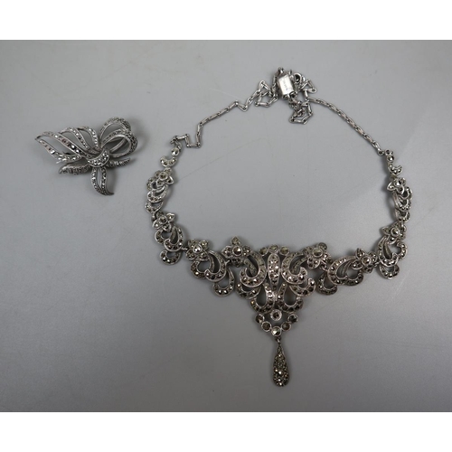 59 - Silver marcasite necklace & brooch