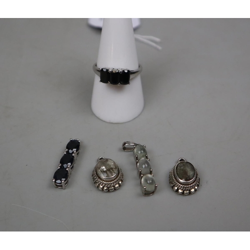 71 - Silver ring together with 4 silver pendants