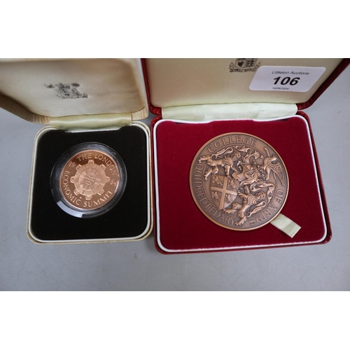 106 - 2 cased Royal Mint medals