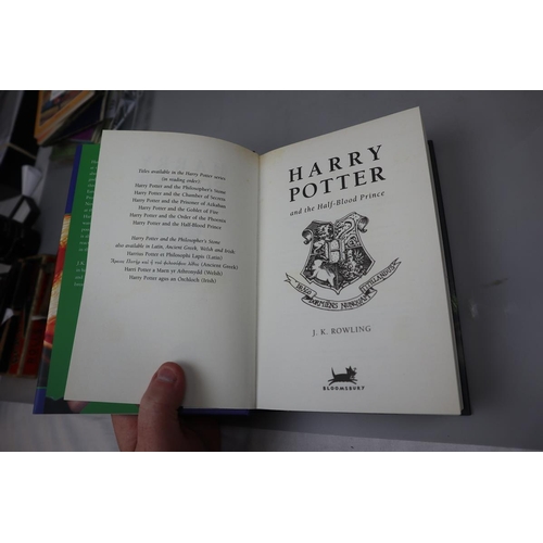 131 - 3 Harry Potter books to include 2 1st editions including The Half Blood Prince with type error