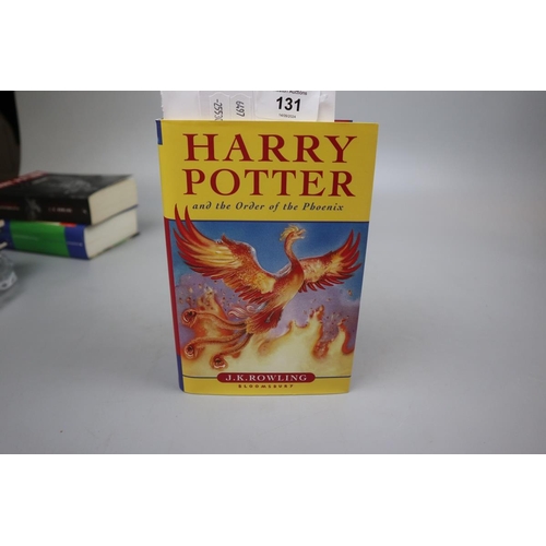 131 - 3 Harry Potter books to include 2 1st editions including The Half Blood Prince with type error