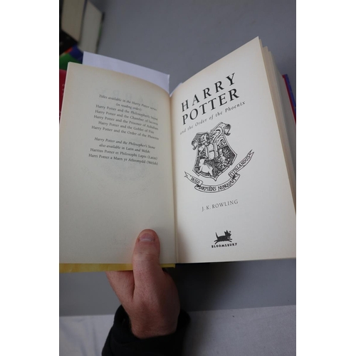 131 - 3 Harry Potter books to include 2 1st editions including The Half Blood Prince with type error