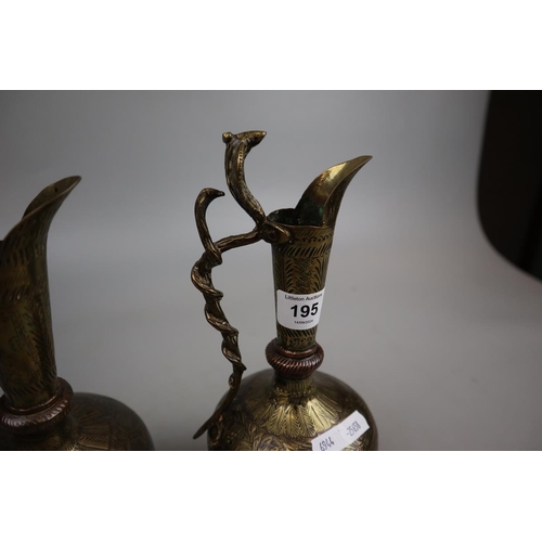 195 - Pair of Eastern brass and copper water jugs adorned with snakes