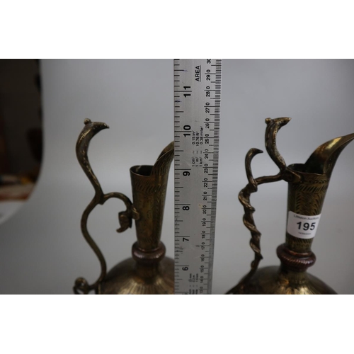 195 - Pair of Eastern brass and copper water jugs adorned with snakes