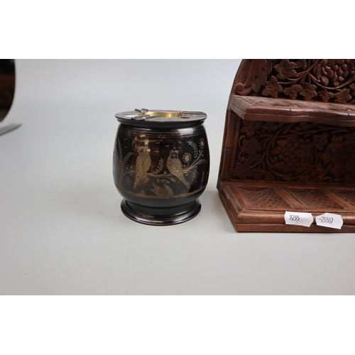 199 - Carved wooden pipe rack, plus brass engraved cigarette dispenser