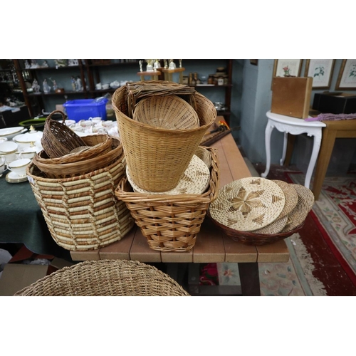 287 - Large collection of baskets & wicker chair