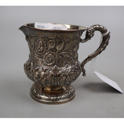 4 - Hallmarked silver jug embossed with floral pattern - Weight 144g