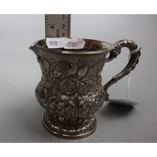 4 - Hallmarked silver jug embossed with floral pattern - Weight 144g