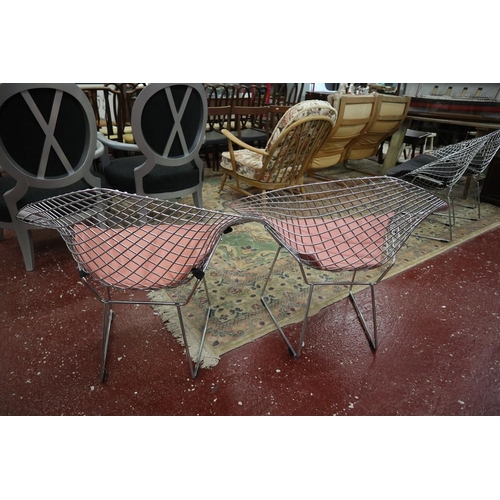 498 - Pair of Bertoia Diamond style chairs with pink cushions