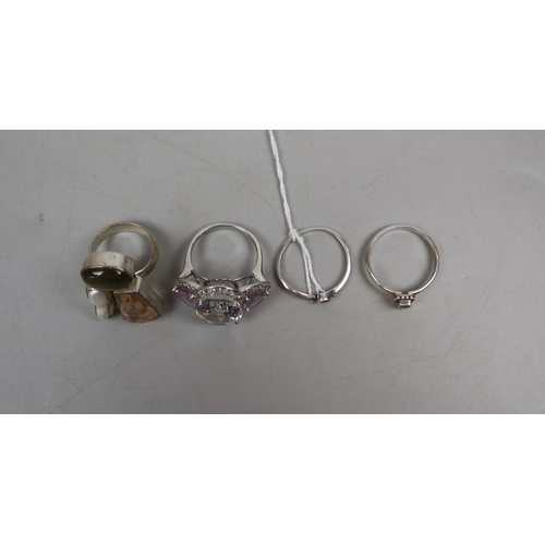 69 - 4 stone set silver rings