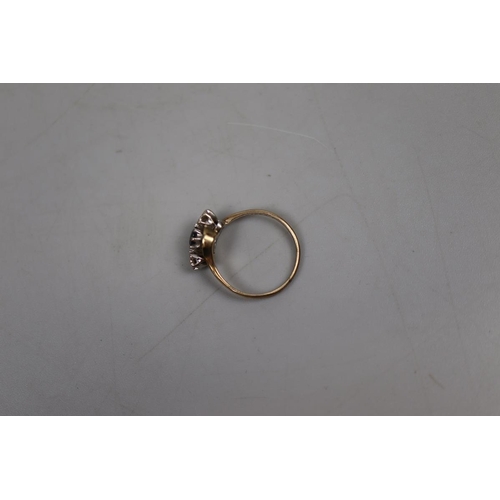 79 - 9ct gold sapphire and diamond ring - Size P