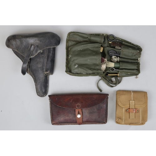 118 - Leather hard cased pistol holster together with gun cleaning kit etc