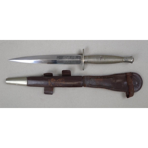 177 - Fairbairn Sykes fighting knife in sheath marked Wilkinson Sword
