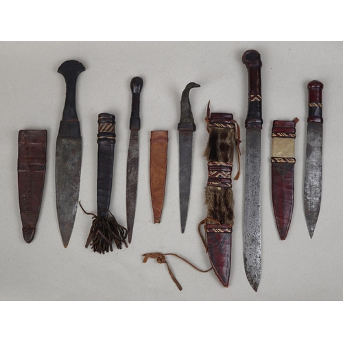 180 - Collection of ethnic tribal knives from Polynesia, New Guinea and Central African Mandinka tribes
