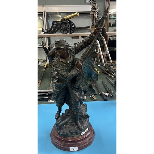 301 - Large bronze figure of a French soldier labeled Jamais (never)