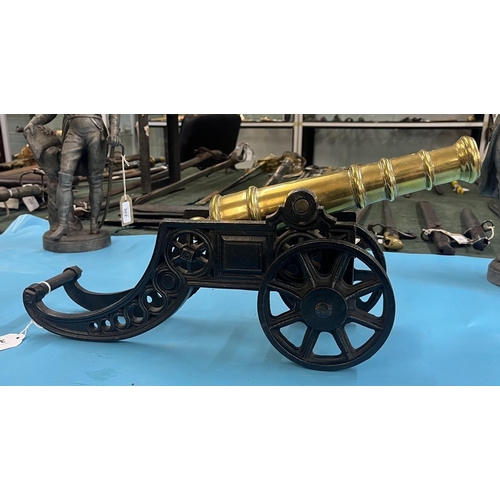 304 - Cast iron canon with brass barrel - Approx length 47cm