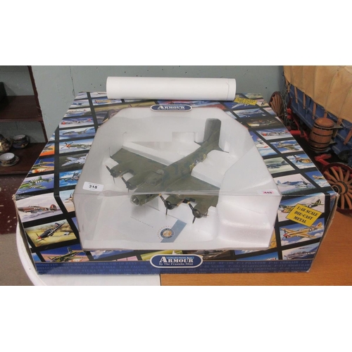 318 - Franklin Mint diecast model of Memphis Belle together with 2 military aircraft prints