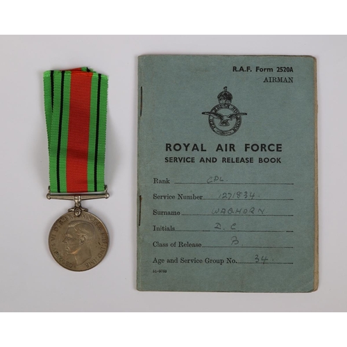 34 - Defence medal and RAF service book - CPL Waghorn