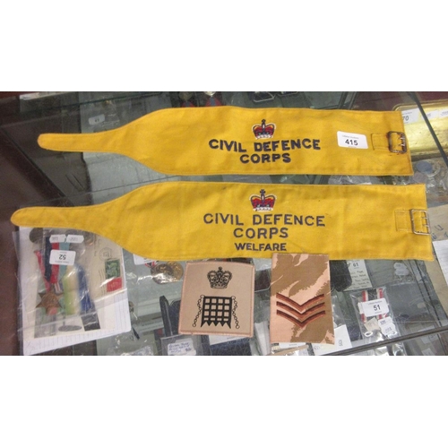 415 - 2 Civil Defense Corps armbands with 2 patches