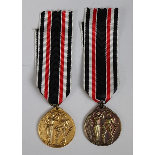 53 - 2 x German medals of Legion of Honour in brass and bronze finishes