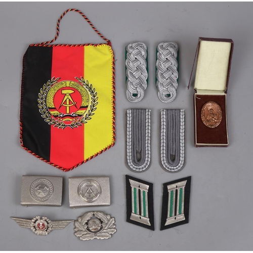 65 - East German militaria items