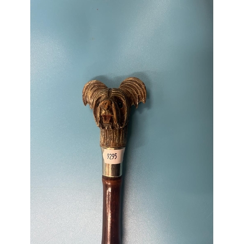 221 - Bamboo cane swordstick with carved wooden handle of a Yorkshire Terrier