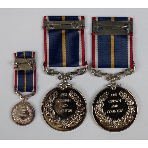 25 - 2 boxed National Service medals plus smaller version and Royal Air Force plaques