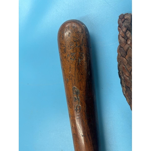 284 - Wooden truncheon together with a kosh