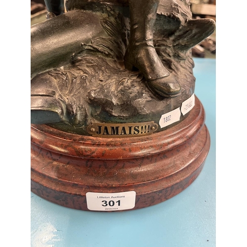 301 - Large bronze figure of a French soldier labeled Jamais (never)