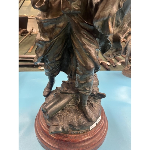 301 - Large bronze figure of a French soldier labeled Jamais (never)