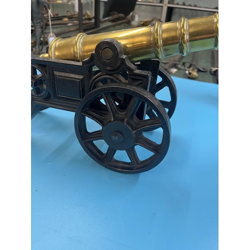 304 - Cast iron canon with brass barrel - Approx length 47cm