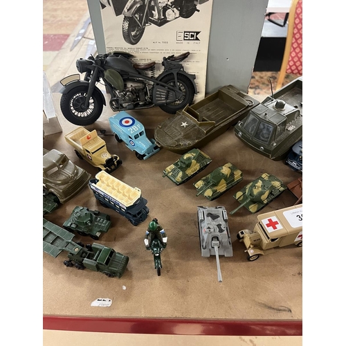 306 - Collection of military vehicles together with boxed Zulu model figures