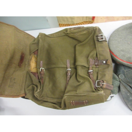 361 - Collection of military satchels, hats and belts etc