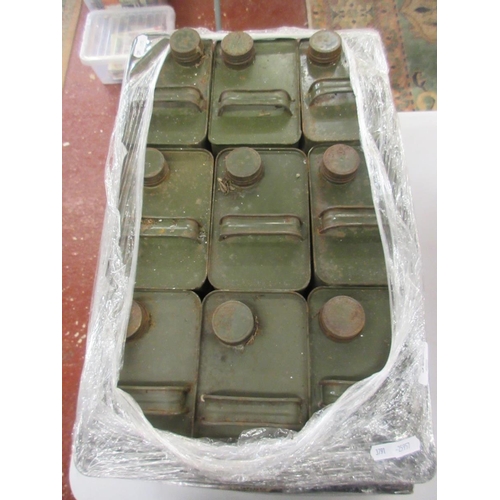 369 - 9 ex-army green metal petrol cans