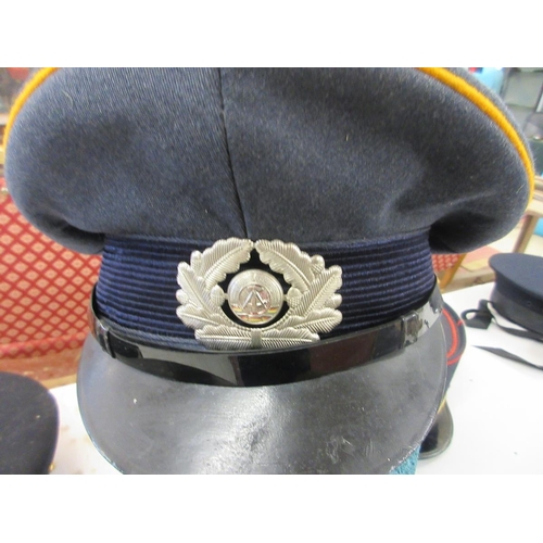 395 - Soviet AirForce Officer's visor cap plus 2 DDR East German military officer's caps and East German n... 